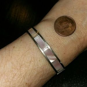 Pink shell in silver tone bangle